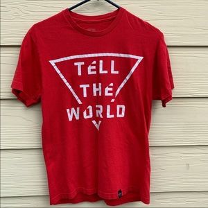 red “tell the world” unisex t-shirt